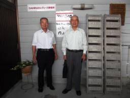 内山隆社長と松岡勉理事長